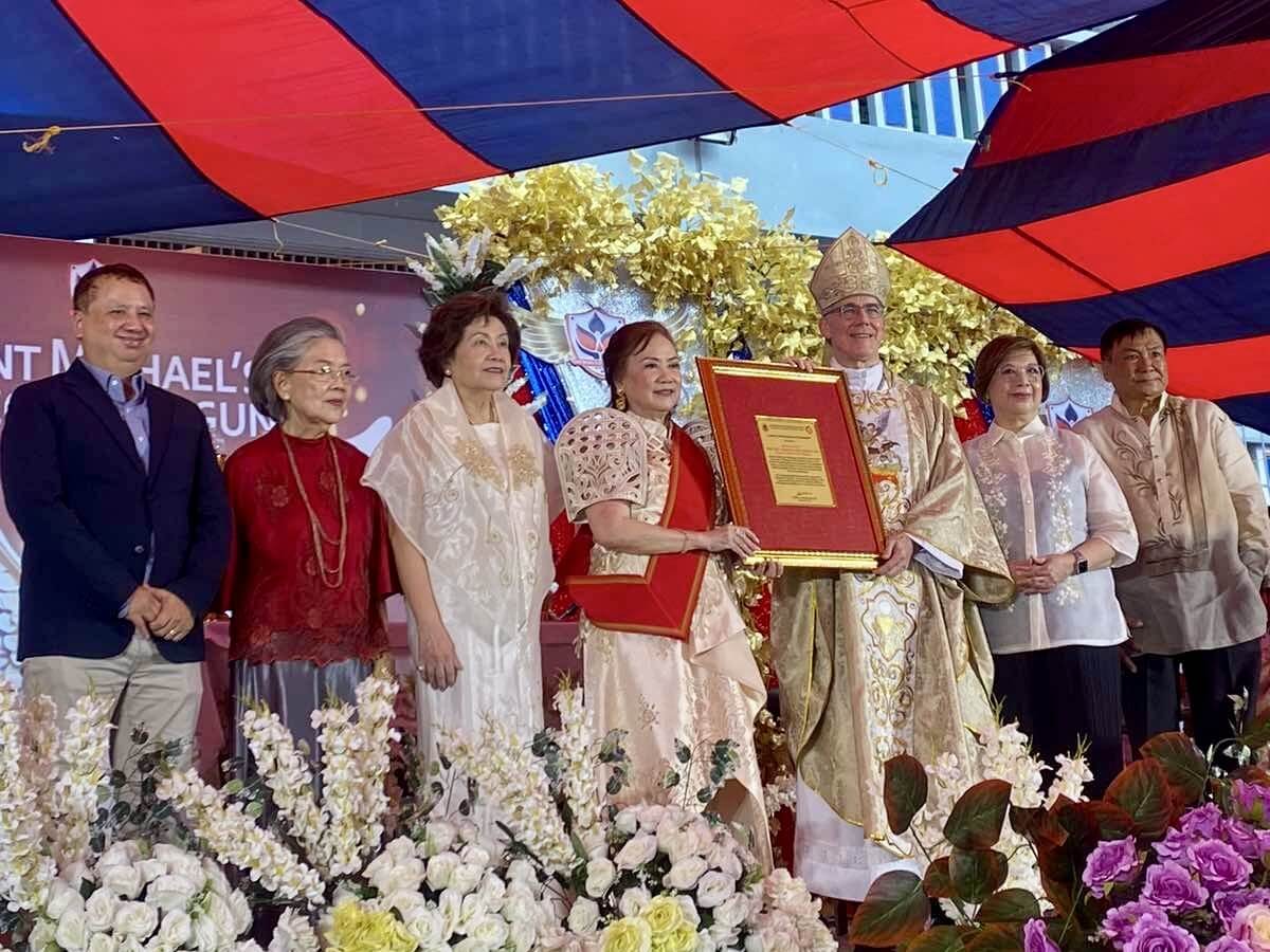Papal Nuncio Charles John Brown (fifth from left), with SMCL officials, at the school's anniversary celebration in Laguna./Contributed photo