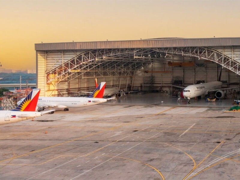 Lufthansa Technik Philippines’ 22.6-hectare maintenance hub at NAIA, where over 3,000 skilled workers service major aircraft types for global carriers.