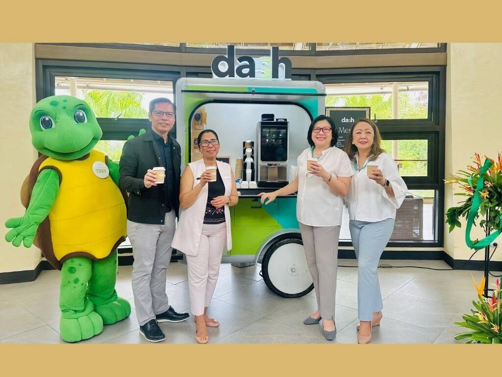A warm welcome on wheels! Guests were greeted with freshly brewed coffee and delightful pastries from the DASH Cart.From left:  Brandy Morales, national key accounts and OCS head; Maxi Gavino, general manager of Pico de Loro Beach & Country Club and Pico Sands Hotel; Leah Magallanes, vice president for quality and sustainability of SM Hotels and Conventions Corp.; and Agnes Pacis, vice president for commercial of SM Hotels and Conventions Corp. raise their cups for the first DASH Cart toast—a symbolic gesture to mark the launch. ​| Contributed photo