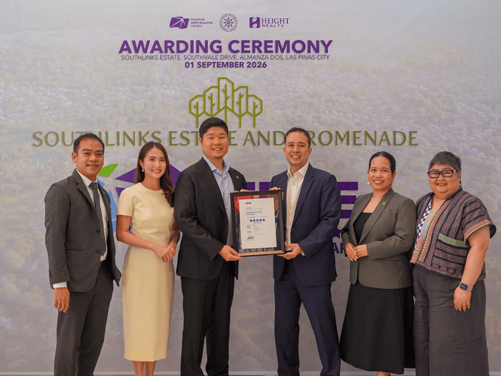 Height Realty president and CEO Kevin Wong (third from left) receives the 5-Star BERDE District rating for Southlinks Estate. Also present were (from left) asst. vice president Jess Nino De Villa; managing director Shirley Wong; PHILGBC chair Raymond Rufino; vice chair Rowena Ramos; and executive director Ma. Anna Tungol. |Contributed photo