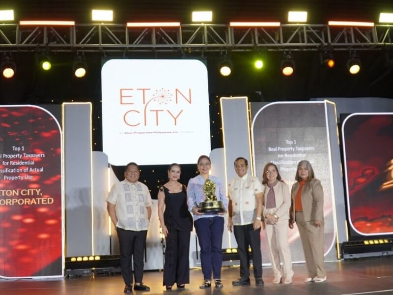 Receiving the award (third from left) was Atty. Milagros S. Umadhay, AVP for Project Compliance of Eton Properties. With her were (from left to right) Congressman Roy Gonzales, Mayor Arlene B. Arcillas, Vice Mayor Arnold B. Arcilla, City Treasurer Analita Constantino, and City Assessor Cecilia Gabayan./Photo from Eton Properties 