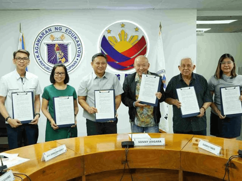 From left: STI VP for communications Elbert De Guzman, DepEd Undersecretary Atty. Debbie Jean I. Centeno-Dijamco, DepEd Secretary Juan Edgardo "Sonny" M. Angara, STI chair Eusebio H. Tanco, STI vice-chair and CEO Atty. Monico V. Jacob, and VP for academics Karen LR. Tabije. | Contributed photo