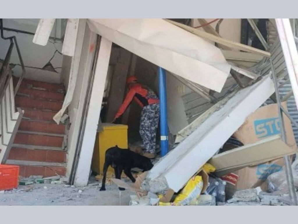 Debris from a commercial building collapse litters Barangay Calumpang, General Santos City following Monday&rsquo;s magnitude 7.8 earthquake. | Photo from Philippine Coast Guard