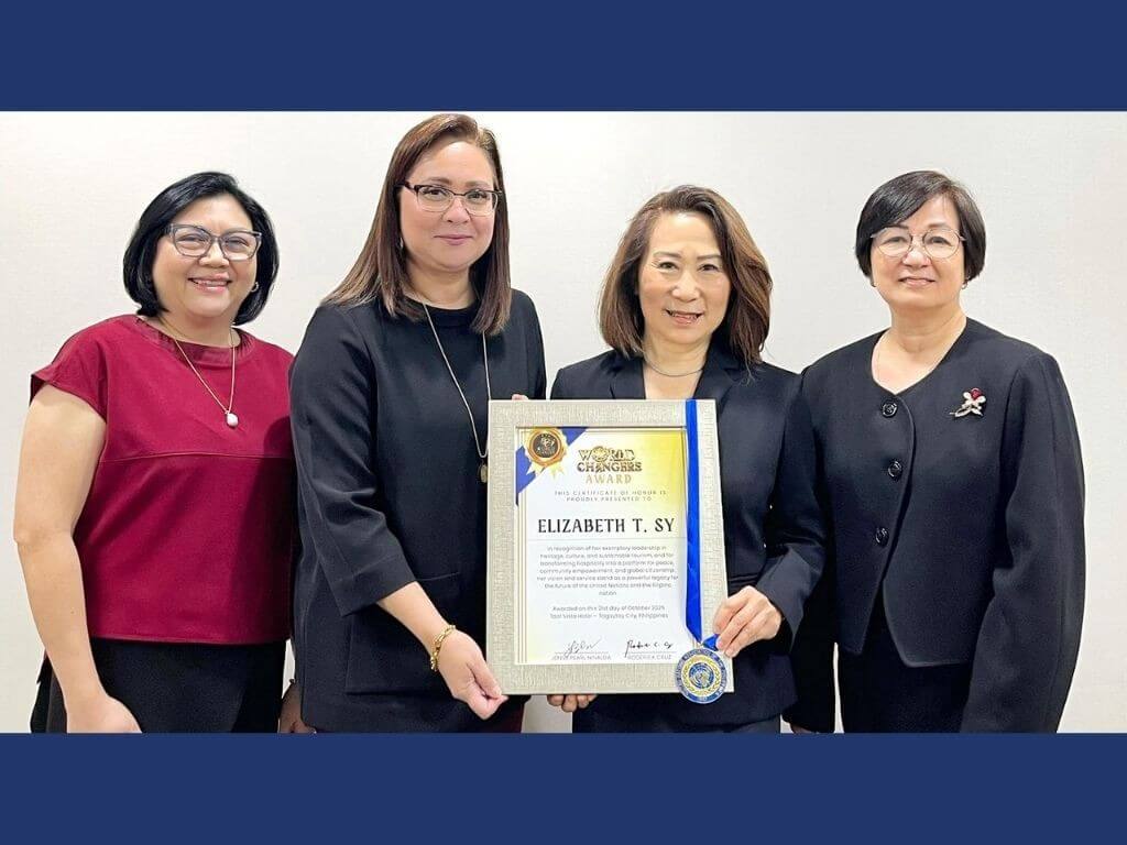 SM Hotels & Conventions Corp. president Elizabeth Sy receives the UNA Presidential Medal and World Changers Award. With her in photo are SMHCC vice president for quality and Sustainability Leah Magallanes, senior vice president for operations Cathy Nepomuceno and executive vice president Peggy Angeles. | Contributed photo