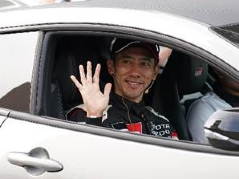 TMP president Masando Hashimoto arrives at the opening ceremony in the New GR Yaris/ Photo from TMP