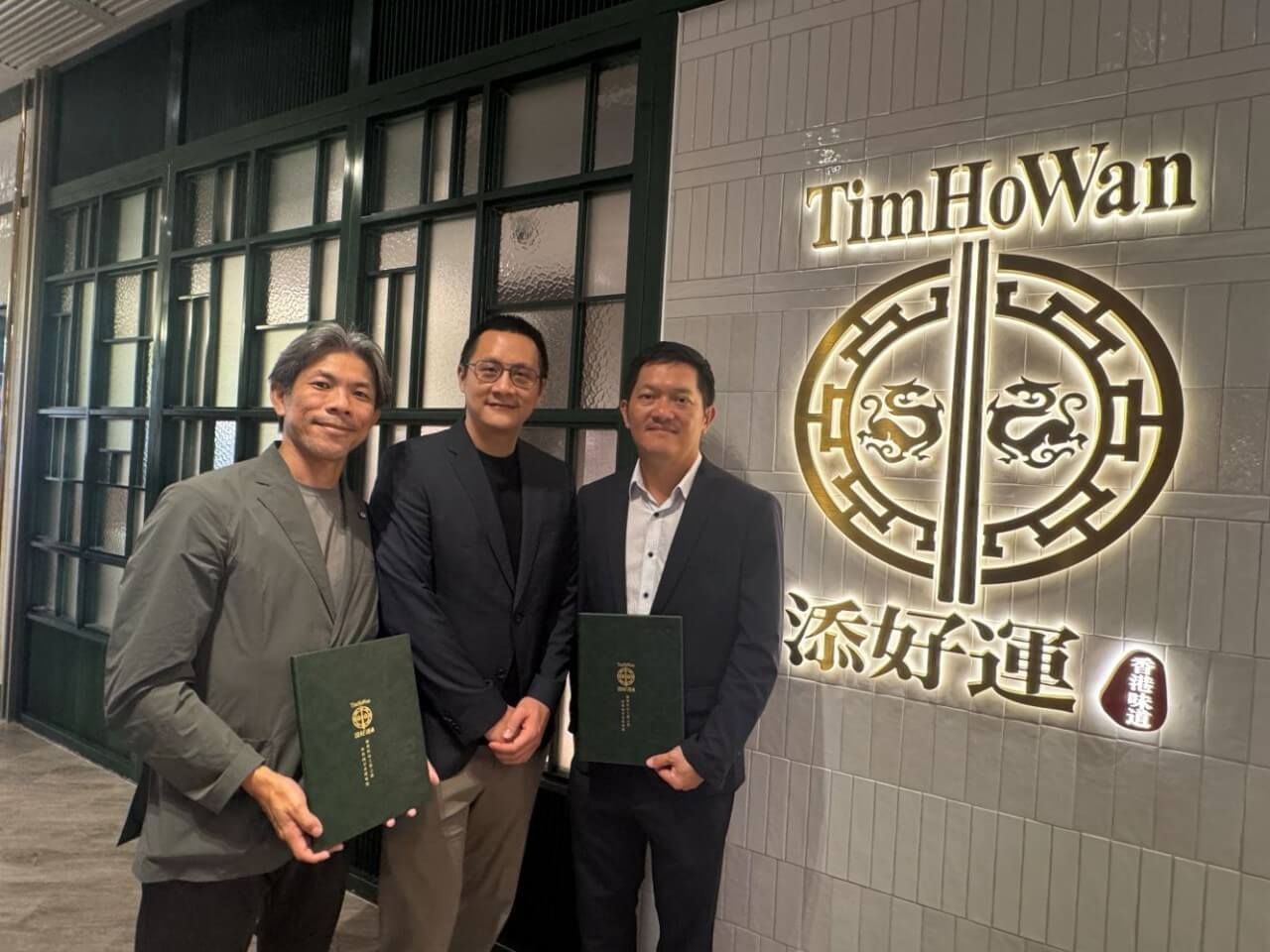 Tim Ho Wan is accelerating its Taiwan expansion with a four-year plan to double its store network from 16 to 32 locations by 2030, reinforcing the brand's role as a scalable, franchise-led growth platform within Jollibee Group. In photo are Jeff Lin (center), CEO of Hoyii Life, Tim Ho Wan's franchisee operator in Taiwan; Lee Yeong Sheng (left), chief executive officer of Tim Ho Wan; and Jessy Lee (right), president of Collins Group. | Contributed photo