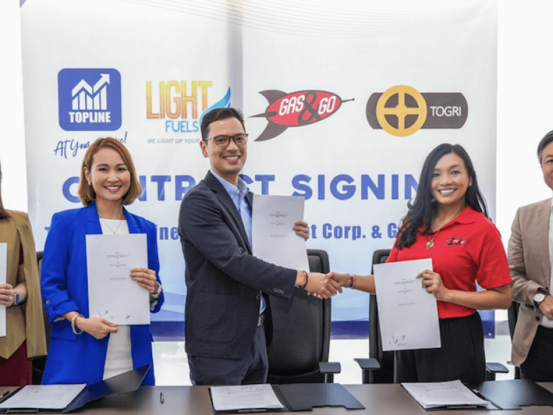 Top Line seals its acquisition agreement with Total Oil & Gas Resources, Inc. and Ballston Metro Corporation. From left to right: Atty. Constance Marie Lim, CPA, First Vice President and CFO; Brigitte Carmel Lim, Senior Vice President and COO; Eugene Erik Lim, President and CEO; Judy Tumangan, President and COO of TOGRI and BMC; and Atty. Daniel Kendrick Tumangan of TOGRI and BMC. CLICK ON PHOTO FOR FULL IMAGE/Photo from Top Line 