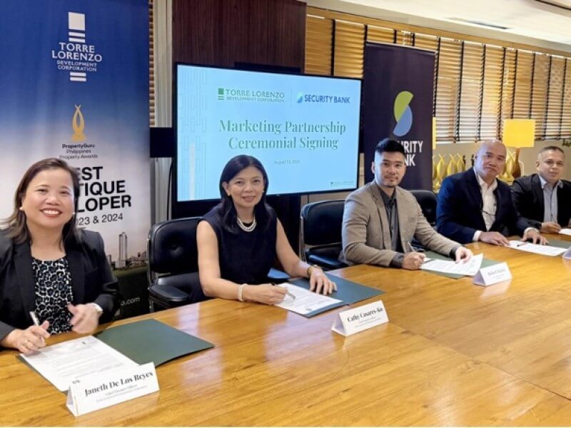 At the ceremonial signing of the partnership. From left: Janeth De Los Reyes, CFO of TLDC; Cathy Casares Ko, CEO of TLDC; Robert Tejuco, VP and corporate banking group team head, Security Bank; Elmer Aquino, VP and developer and direct sales channels head of Security Bank; and Joey Sison, FVP and focus segment head, Security Bank./Contributed photo (Click the photo to view full image)