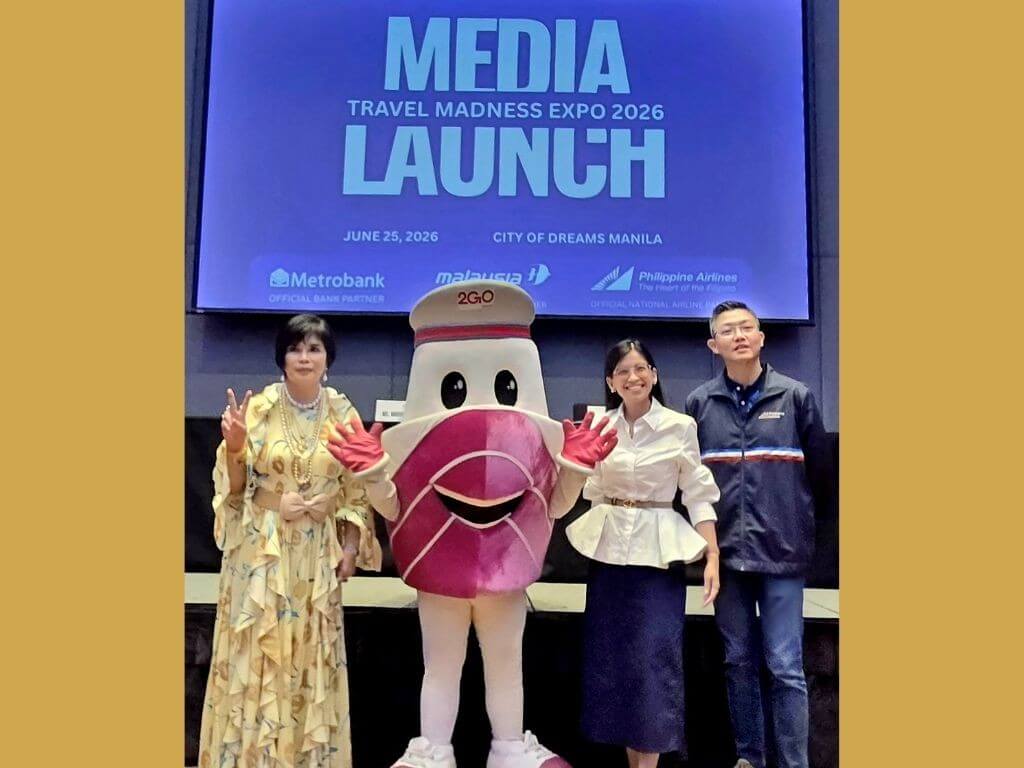 From left: Ma. Paz Alberto, chairperson, Travel Madness Expo 2026 ; Amabelle Nocum, head of usage, partnership and communication, Metrobank ; Bryan Ang , regional head-Philippines, Philippine Airlines pose with 2Go mascot Shippy during the media launch of Travel Madness Expo 2026. | Contributed photo
