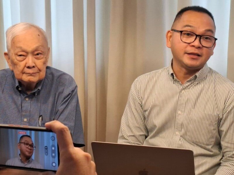 Lawyer Augusto Go, University of Cebu chair, and Christopher San Pedro, legal counsel of Dreamark TW, announced a partnership that will give UC students in hospitality management and tourism access to paid internships&mdash;and potential employment&mdash;in Taiwan.. | Contributed photo