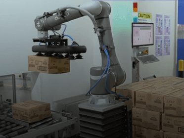 Unilever's collaborative robot or cobot automatically palletize finished goods boxes.  Cobots take away some of the environmental and spatial dangers traditional robots may cause, allowing them to work alongside humans./ Contributed photo ​
