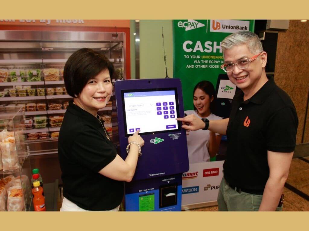 Maria Patricia D. Pascual, ECPay president &nbsp;and CEO and Albert Cuadrante, chief marketing and experience officer and EVP of UnionBank of the Philippines. | Contributed photo