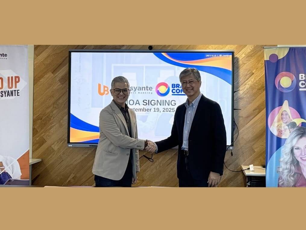Albert Cuadrante (left), chief marketing and experience officer of UnionBank and Bingo Soriano, founder of Branding Nerd, seals the partnership between UnionBank and BRAND CON 2025 for the country’s first annual convention on branding excellence for SMEs, to empower Filipino entrepreneurs through innovation and financial inclusion. | Contributed photo