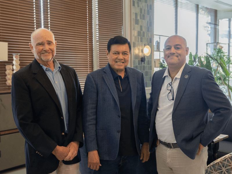 From left: Brian Curley, Manuel Villar Jr., and Jim Wagner during the signing of the agreement for the Villar City golf course project./Photo from the Villar group