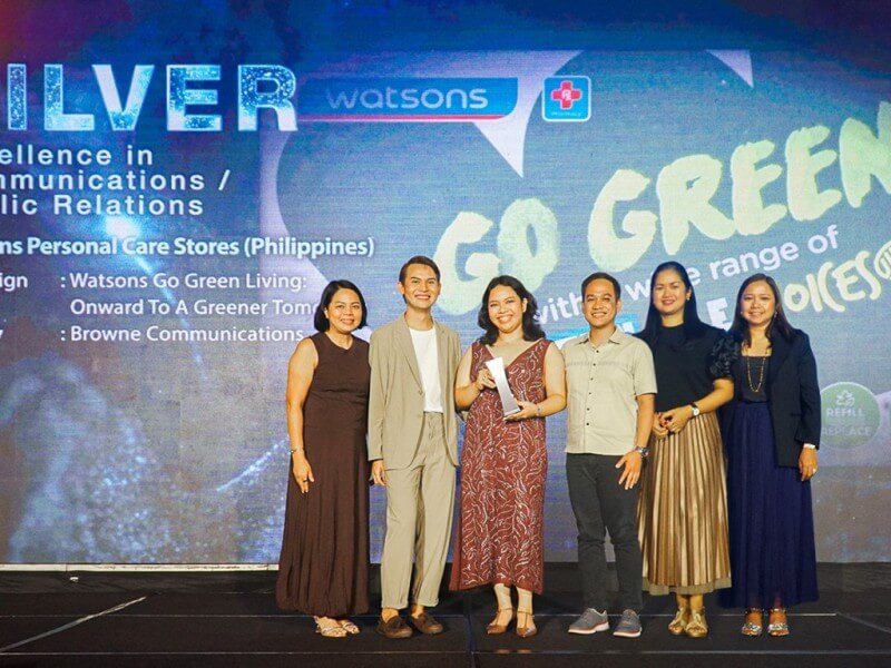  Watsons Philippines receives recognition at the 2025 Marketing Excellence Awards Philippines for its “Go GreenLiving: Onward to a Greener Tomorrow” campaign. Laarni Reyes (left), managing partner, Browne Communications; Renz Laluz, assistant marketing manager; Alisandrea Coloma, senior marketing manager – PR and sustainability; Dharell Fontanilla, senior marketing manager; and Sharon Decapia, SAVP – marketing, PR and sustainability, all from Watsons Philippines, with Amby Molina, business development director at Browne Communications./Contributed photo