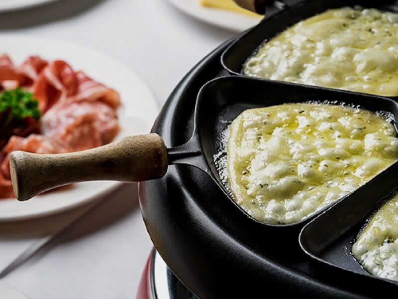 Old Swiss Inn served Swiss comfort food favorites such as raclette, fondue and its signature fresh corned beef for generations of Makati diners./Image from Old Swiss Inn&nbsp;