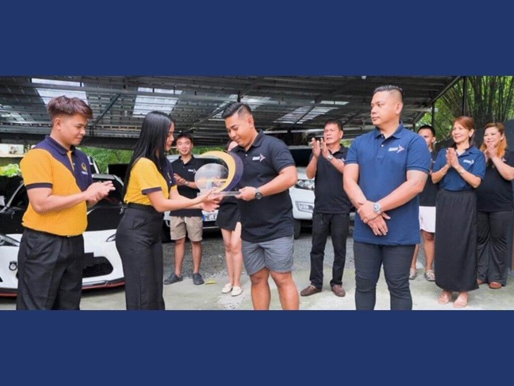 KCars Auto-Exchange receives the Fastest Growing SME Award from the Global Dominion team. | Contributed photo