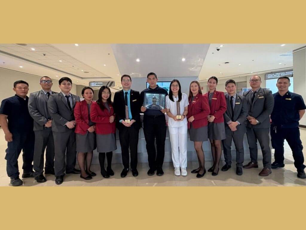 The SMX Convention Center Clark team proudly holds their trophies in the property&rsquo;s lobby, celebrating a defining moment for the venue. | Contributed photo