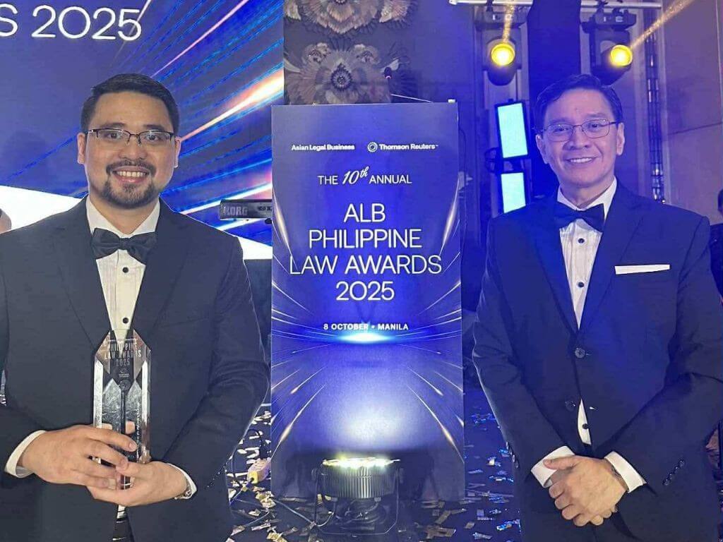 FNI’s Reeno Febrero (left) was named Young Lawyer of the Year (In-House) in this year's ABL awards, seen here with FNI legal chief Noel Lazaro./Contributed photo