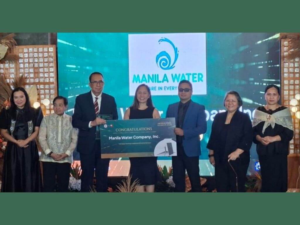 MWC East Zone chief operating officer Arnold Mortera (center left) and MWC energy director King Verzola (center right) receive the 2025 DOE Sustainable Energy Award for the Private Institution category from Energy Secretary Sharon Garin (center). | Contributed photo