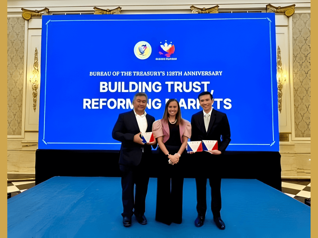 Receiving the awards are Metrobank financial markets sector head Toto Tansingco (leftmost) and Metrobank head of treasury group John Christopher Lu (rightmost), flanking National Treasurer Sharon Almanza. | Contributed photo
