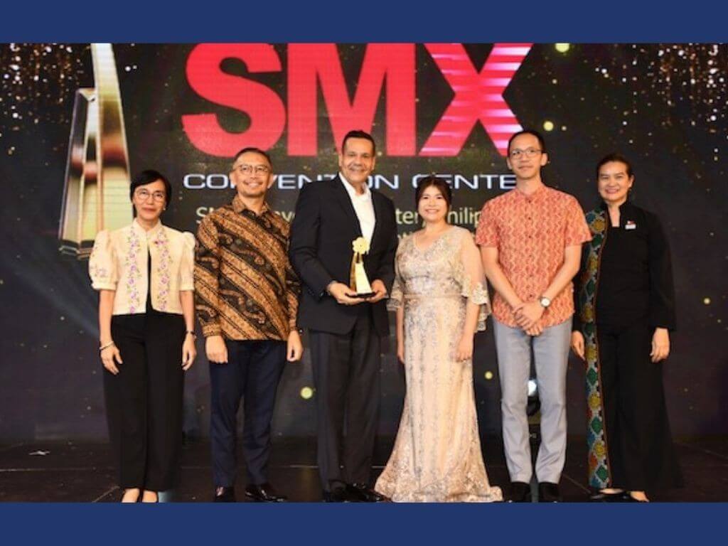 Walid Wafik, senior vice president&ndash;operations of SM Hotels and Conventions Corporation receives the Best Asean Convention Centre Award 2026 on stage with the rest of the SMX team at the 35th ASEANTA Excellence Awards. | Contributed photo