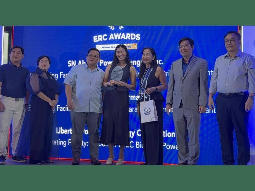 SNAP AVP for regulatory affairs Andrea Toyoda receives award from ERC Chair and CEO Francis Saturnino Juan, Energy Secretary Sharon Garin, and ERC commissioners Marko Romeo Fuentes, Floresinda Baldo-Digal, Paris Real, and Amante Liberato. | Contributed photo