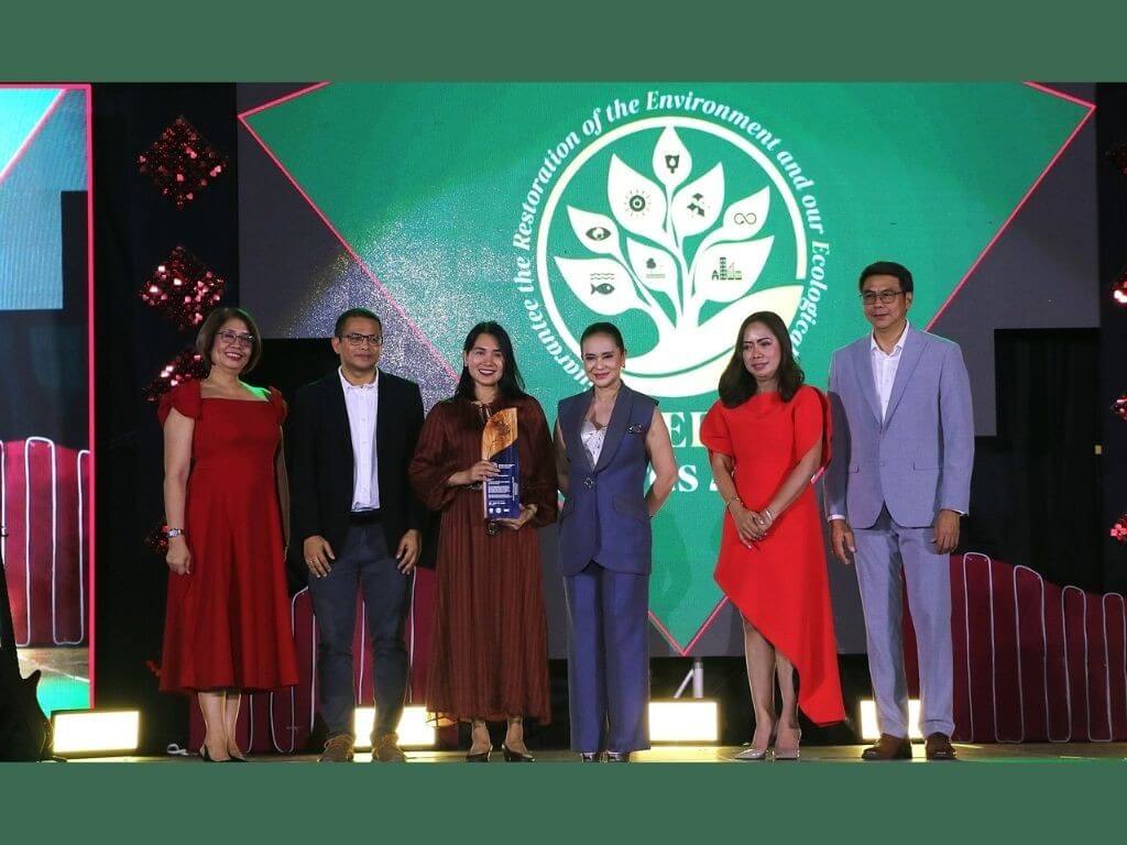 Toyota Motor Philippines (TMP) senior vice president for General Administration Jhohana Mamonong and TMP assistant vice president for Plant and Facility Mark Anthony Marcelo receive the &lsquo;Renewable Energy and Efficiency&rsquo; award during the 2026 Green Awards at the Santa Rosa Multipurpose Complex. The awards were presented by Santa Rosa City Mayor Arlene Arcillas, together with other key city officials. | Contributed photo