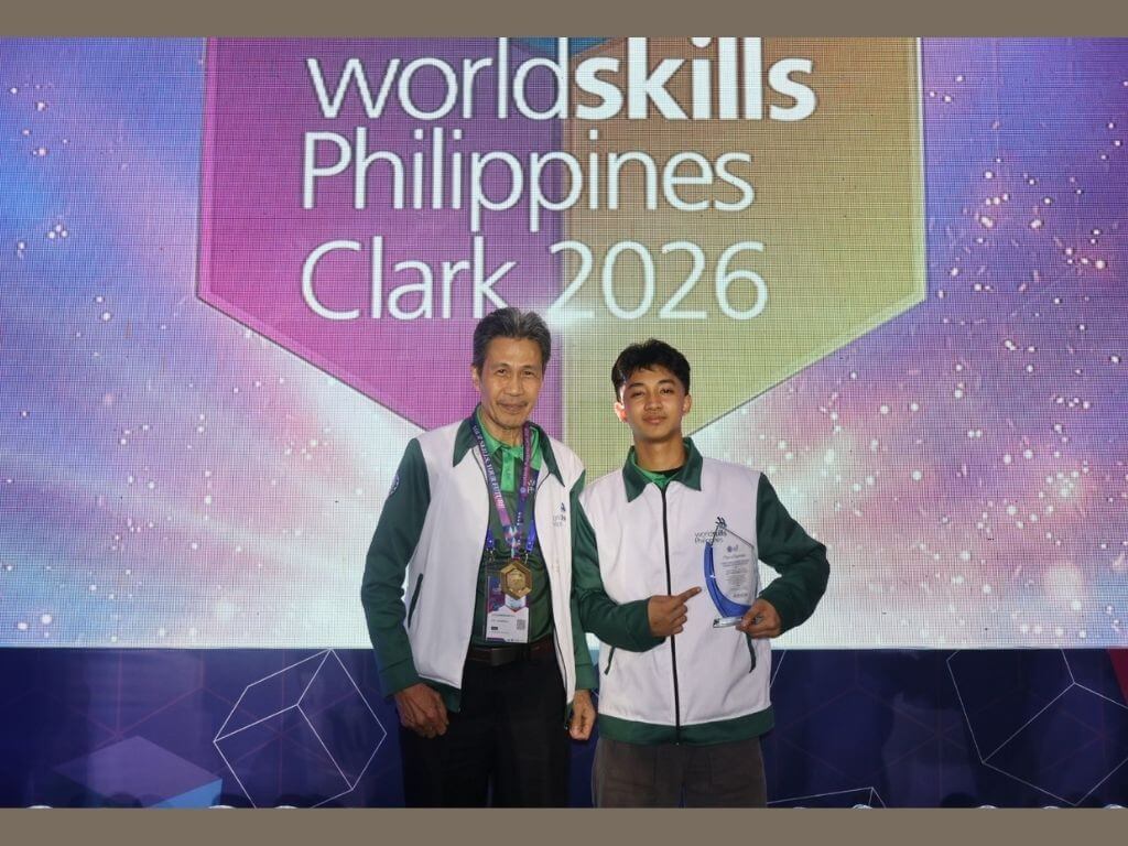 Toyota Motor Philippines Tech Master Instructor Apolinar Rampola (left) and gold medalist David Kryzjan Escobar. | Contributed photo